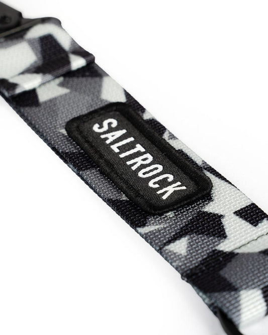 A black and white camouflage strap with the brand name Saltrock on it.
