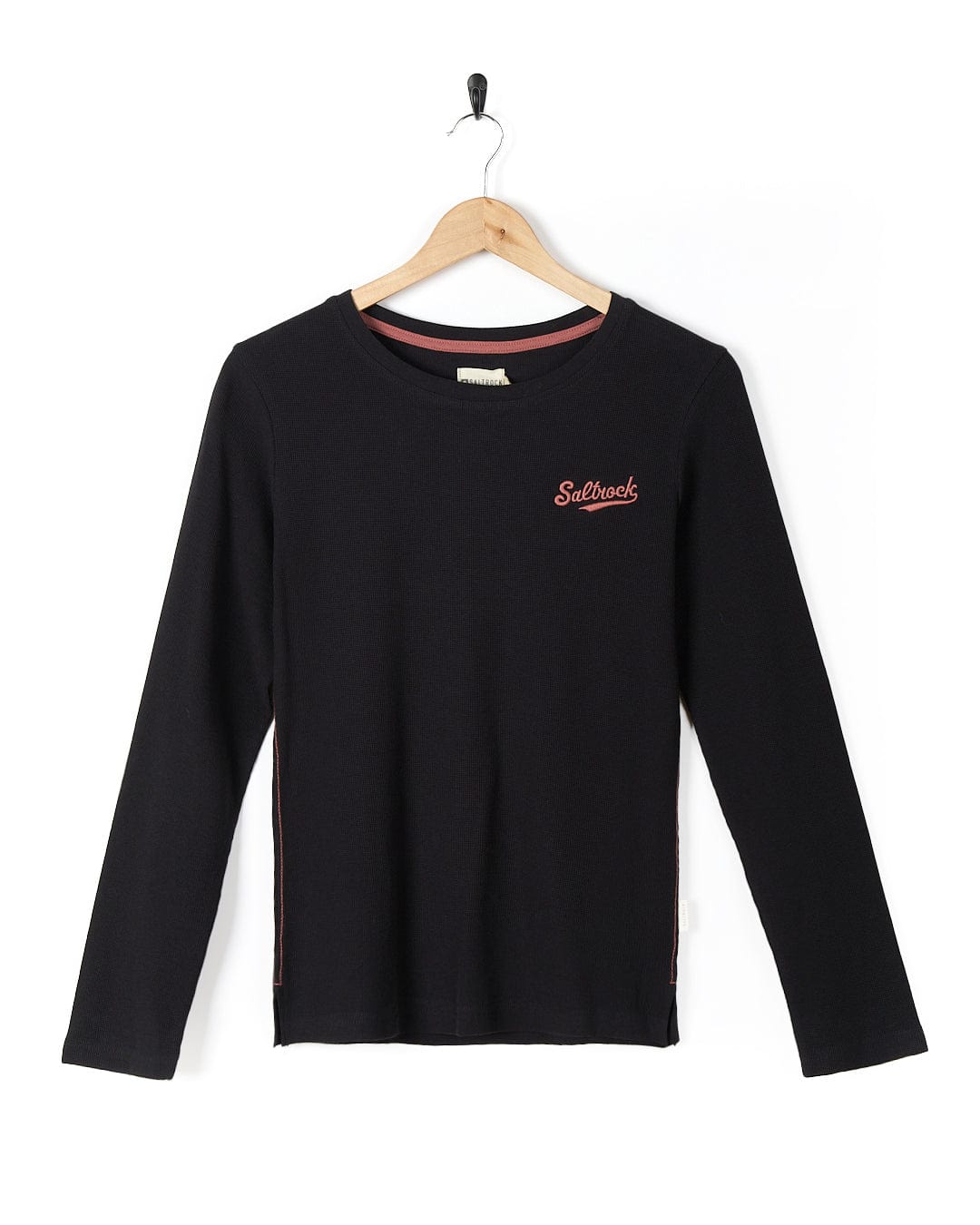 A Saltrock Rory Womens Long Sleeve Waffle T-Shirt - Black with an embroidered logo.
