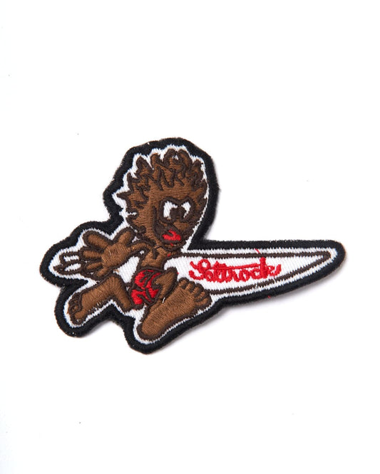 A Running Man - Patches - Brown iron on patch with a surfboard design on a white background by Saltrock.