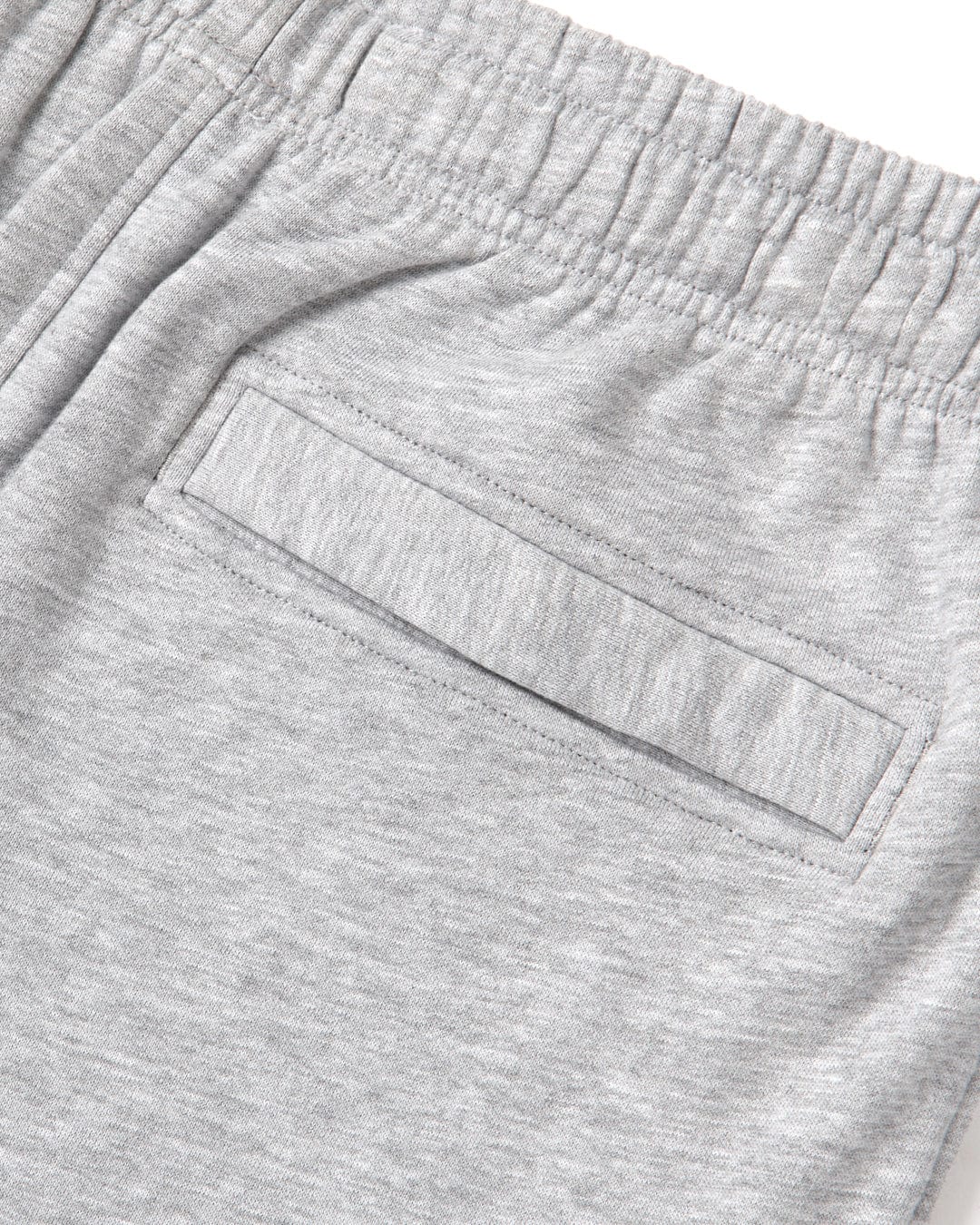 Close-up of a Saltrock Original - Mens Joggers - Grey with a stitched pocket detail.