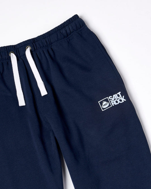 Saltrock Original - Mens Joggers - Dark Blue jogger pants with white drawstrings, Saltrock branding on the left thigh, and a soft jersey material.