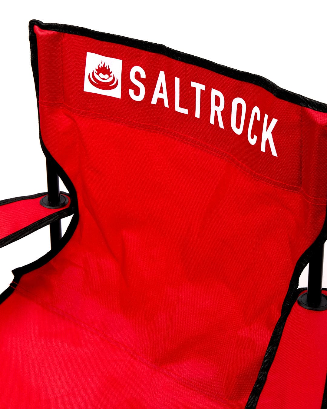 A lightweight, red Sanur - Foldable Beach Chair with the Saltrock logo on it and a mesh cup holder.