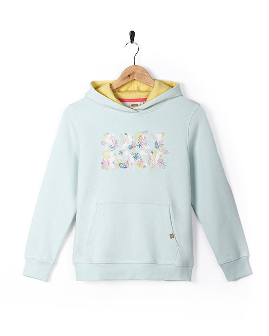 A Seabed - Kids Pop Hoodie - Light Blue sweatshirt with a yellow hood on a Saltrock swinger.