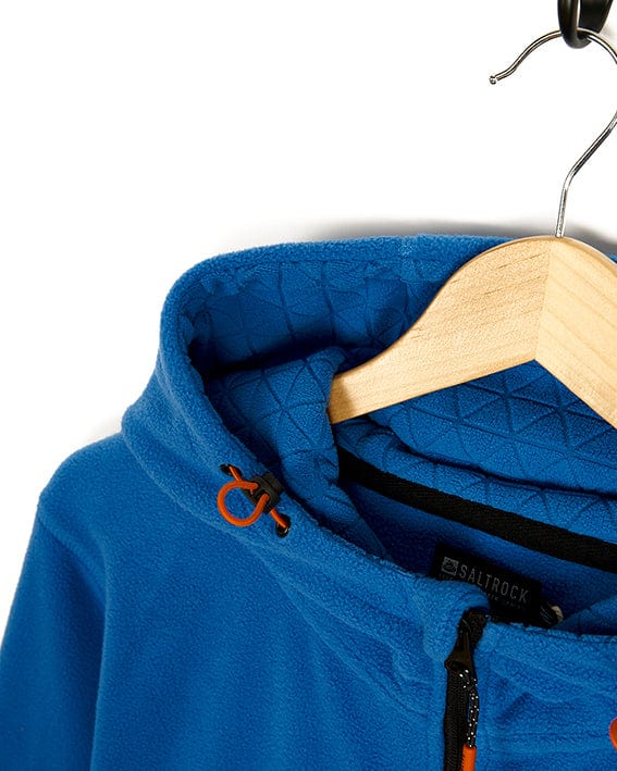 A Senja - Mens Fleece Hoodie - Blue with Saltrock branding hanging on a hanger.