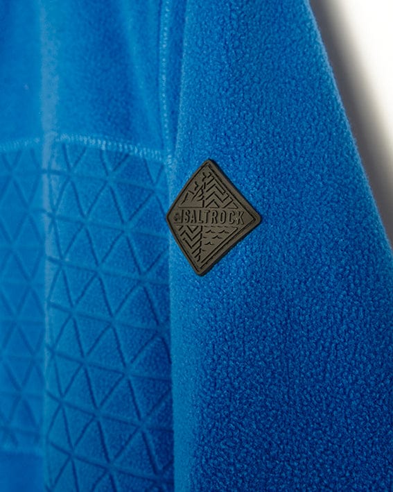 A close up of a Senja - Mens Fleece Hoodie - Blue with Saltrock branding logo on it.