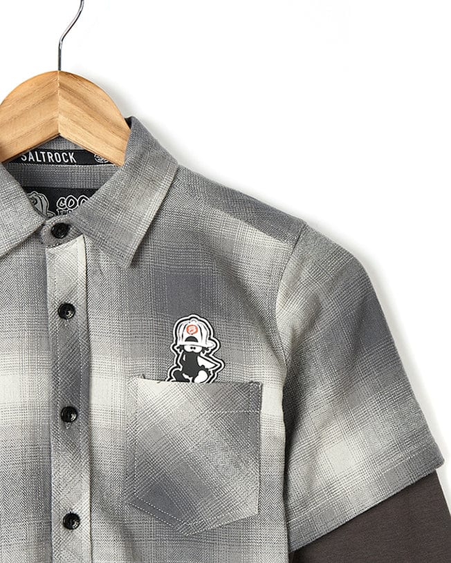 A Saltrock Slacker - Kids Shirt - Grey with a black and white owl on it.