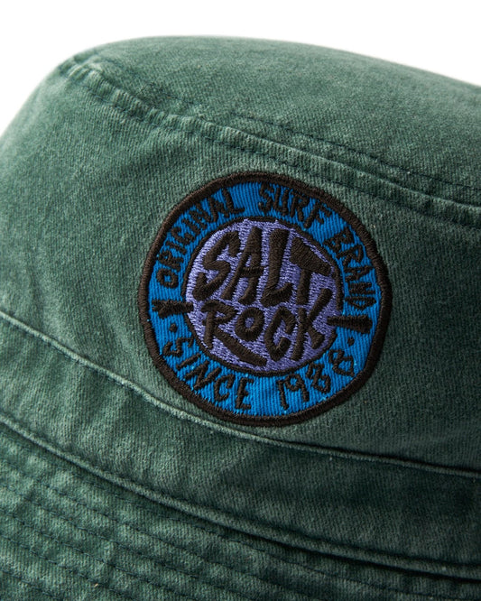 Close-up of a SR Original - Bucket Hat - Green with circular ventilation eyelets and a Saltrock badge patch.