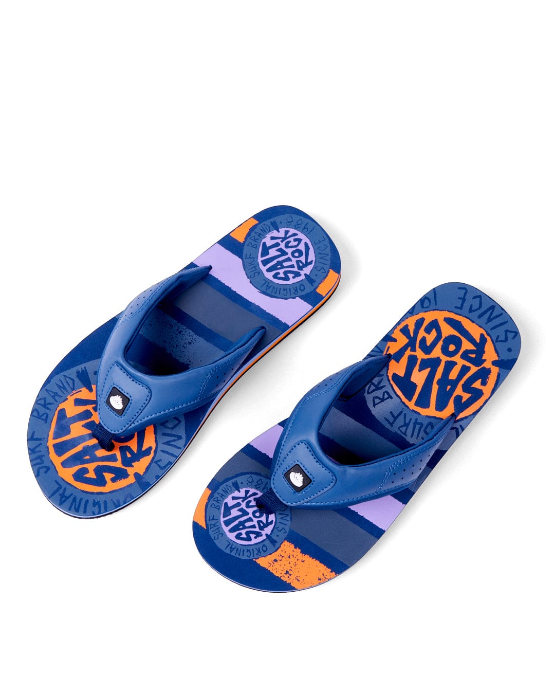 A pair of blue and orange flip flops with Saltrock branding on the insoles, positioned on a white background.