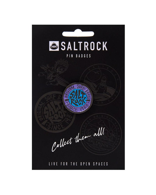 A Saltrock merchandise card displaying a collection of SR Original pin badges with surf-inspired, branded graphics and safety clasp.
