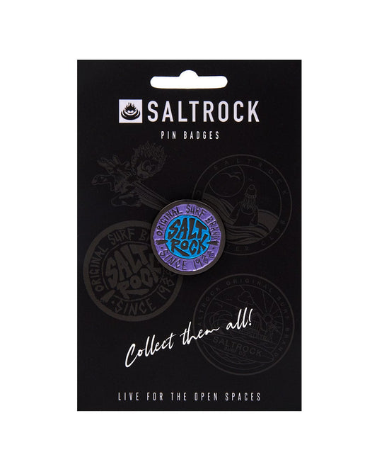 A Saltrock merchandise card displaying a collection of SR Original pin badges with surf-inspired, branded graphics and safety clasp.