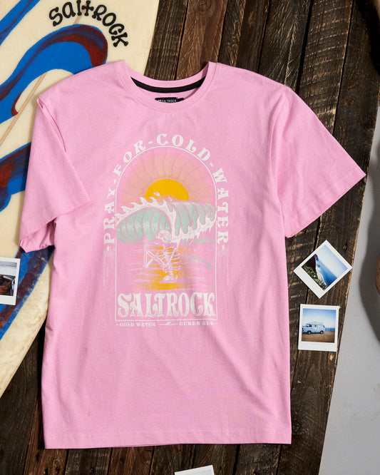 A Cold Water - Womens Short Sleeve T-Shirt - Pink by Saltrock with a surfboard on top of it.