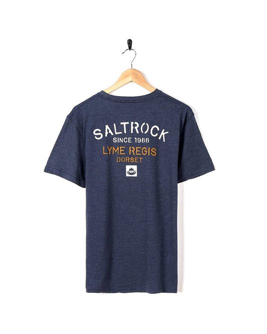 A Stencil - Location T-Shirt - Lyme Regis - Blue with the brand name Saltrock on it.