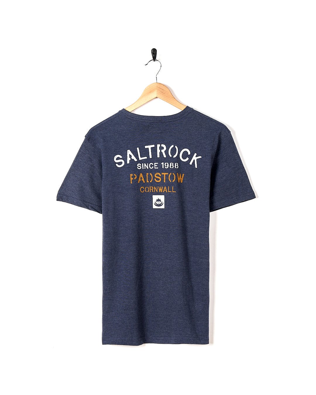 A Stencil - Location T-Shirt - Padstow - Blue with the brand name Saltrock on it.