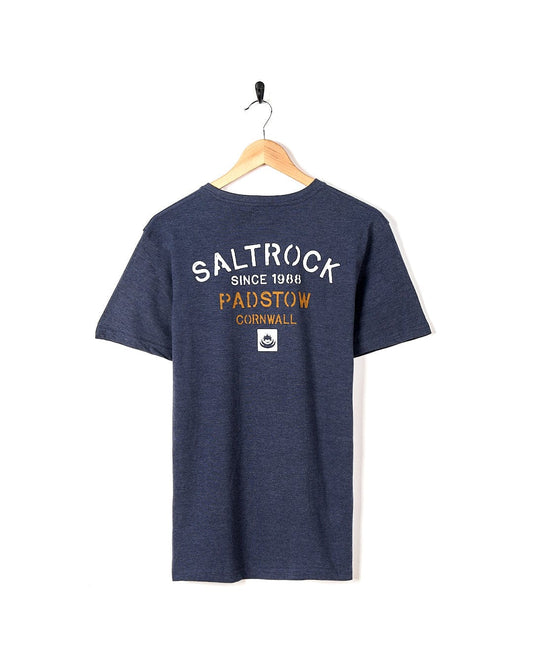 A Stencil - Location T-Shirt - Padstow - Blue with the brand name Saltrock on it.