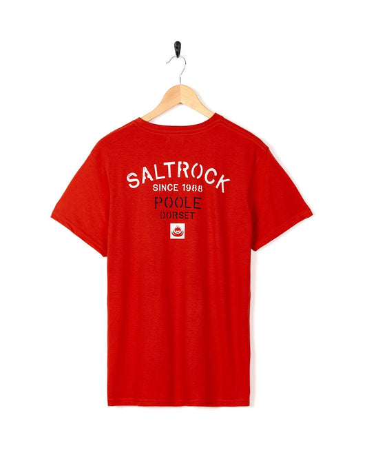 A Stencil - Mens Location T-Shirt - Poole - Red with the brand name Saltrock on it.