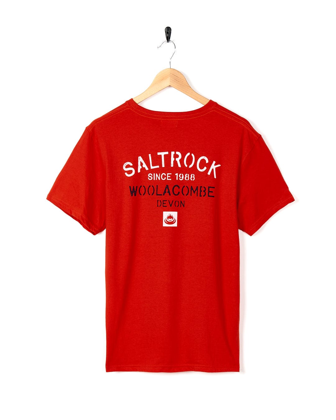 A Stencil - Mens Location T-Shirt - Woolacombe - Red with the brand name Saltrock on it.