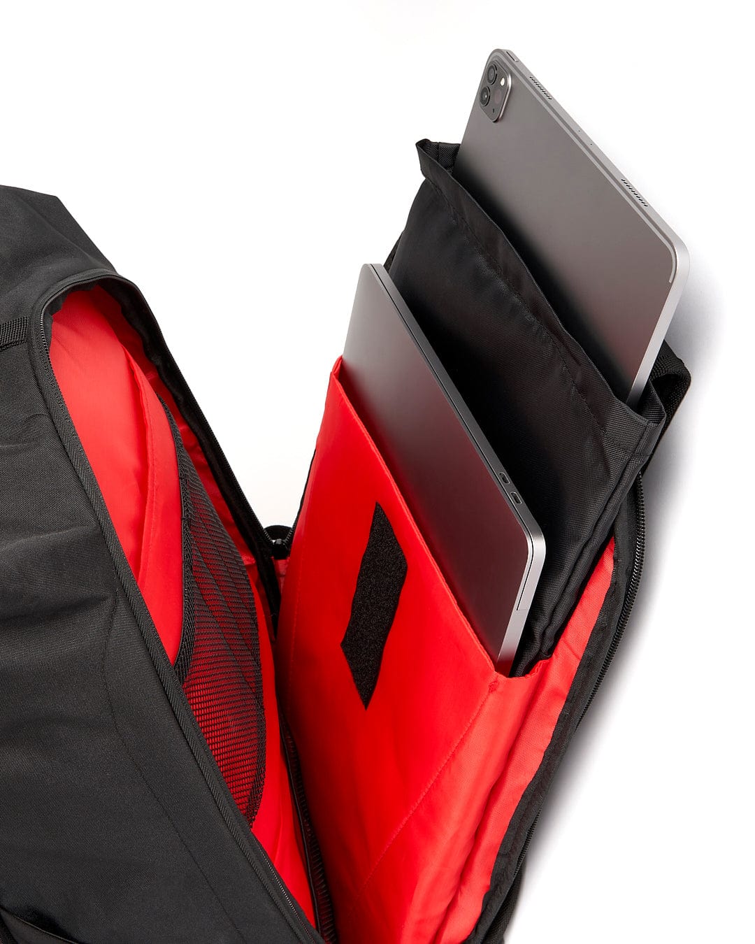 A Saltrock Streamline - Backpack - Black with an ipad inside.