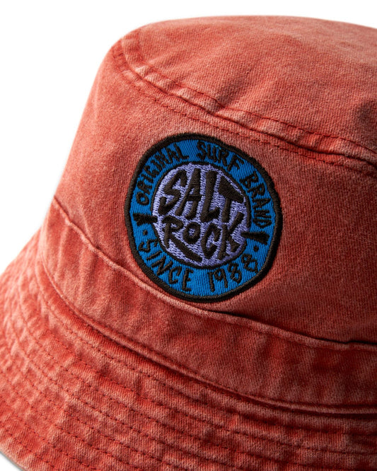 Replace "Red cotton bucket hat" with "SR Original - Bucket Hat - Burnt Orange by Saltrock with a blue "Saltrock" badge logo patch and ventilation.