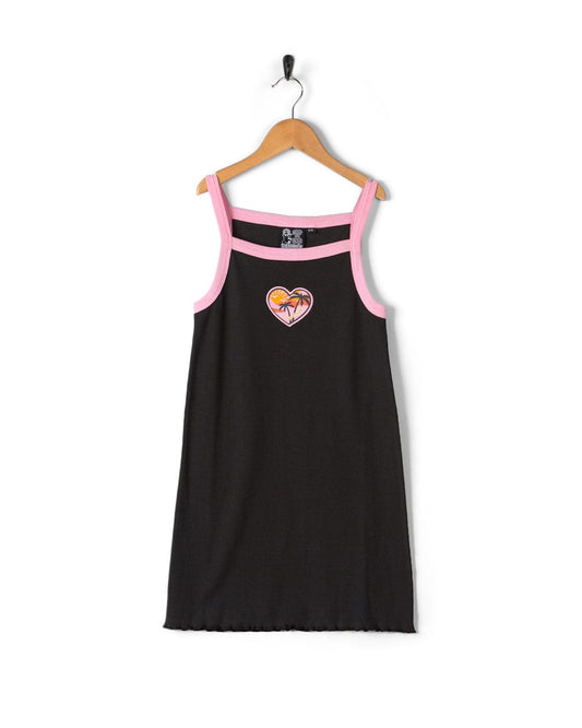 A Saltrock black tank top with a heart embroidered in pink.