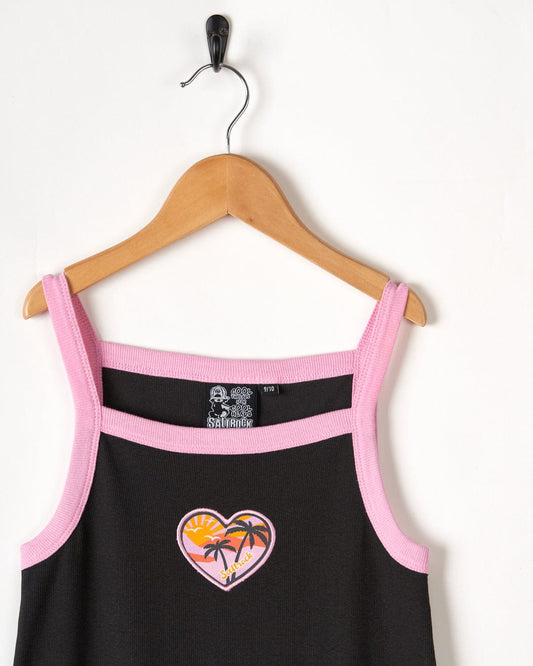 A Sunshine State - Kids Dress - Black with a pink heart embroided on it by Saltrock.