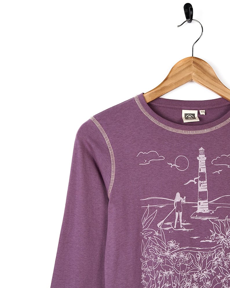 A cotton Saltrock Sup Girl's T-Shirt with a graphic drawing of a lighthouse.