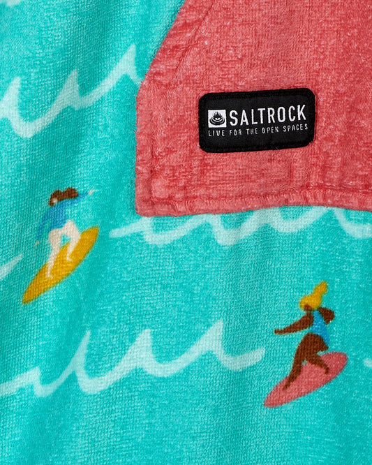 A Surf Sister - Kids Changing Towel - Turquoise shirt with surfboards and surfers on it. Brand: Saltrock