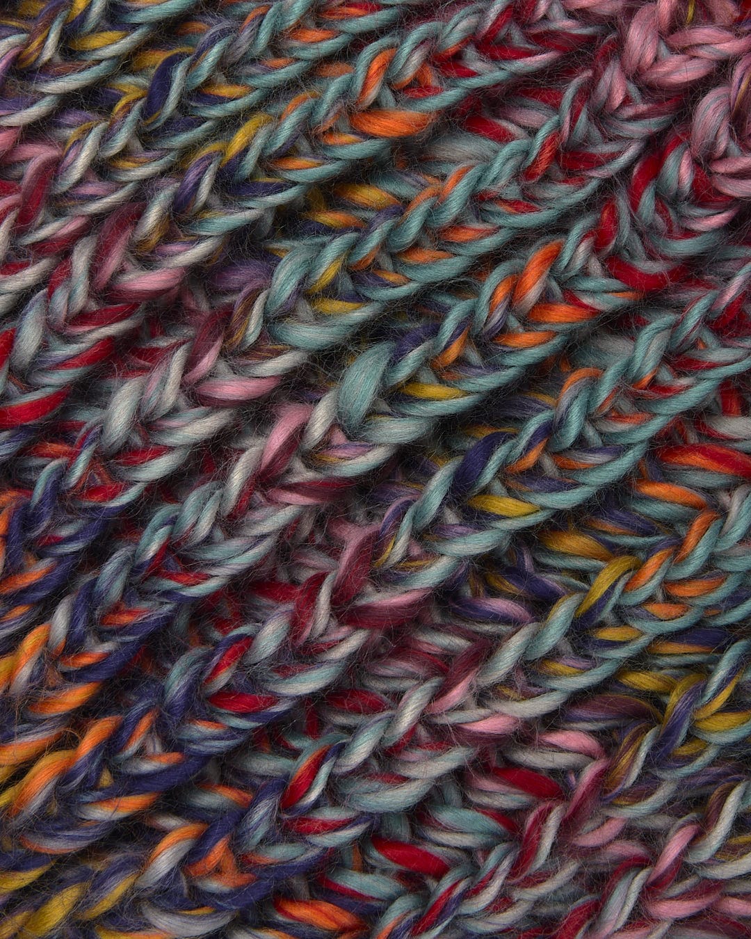 A close up image of a Saltrock Surprise - Beanie - Multi colored yarn.