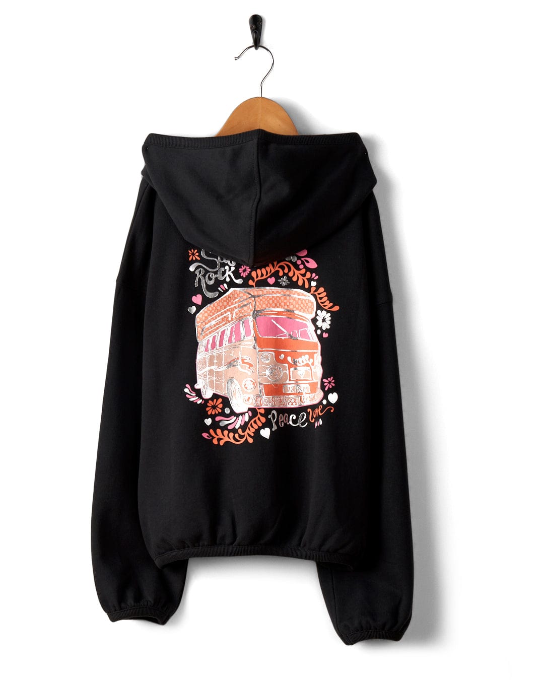 Tahiti Van - Kids Zip Hoodie - Washed Black hanging on a wooden hanger, featuring a colorful graphic print of a building with the text "rock 'n' roll" above and "peace" below.