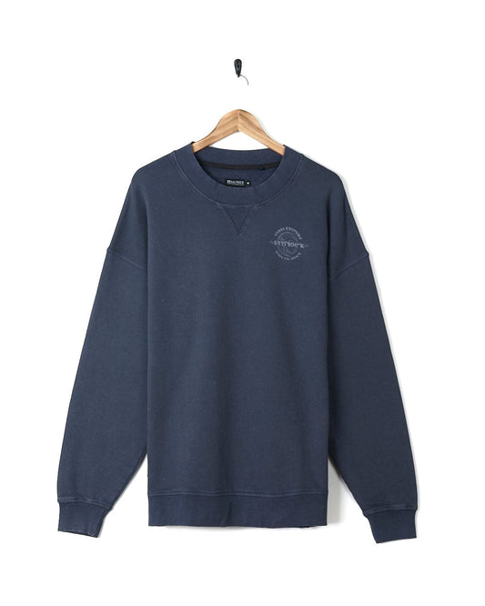 A dark blue sweatshirt with an embroidered Saltrock logo on it.