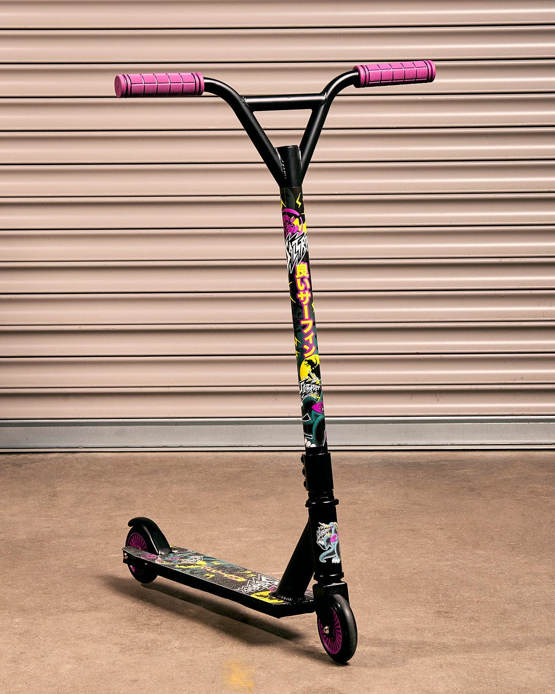 A Saltrock Tokyo Smackdown - Stunt Scooter - Black and purple with a pink handlebar.