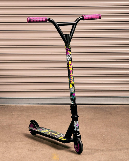 A Saltrock Tokyo Smackdown - Stunt Scooter - Black and purple with a pink handlebar.