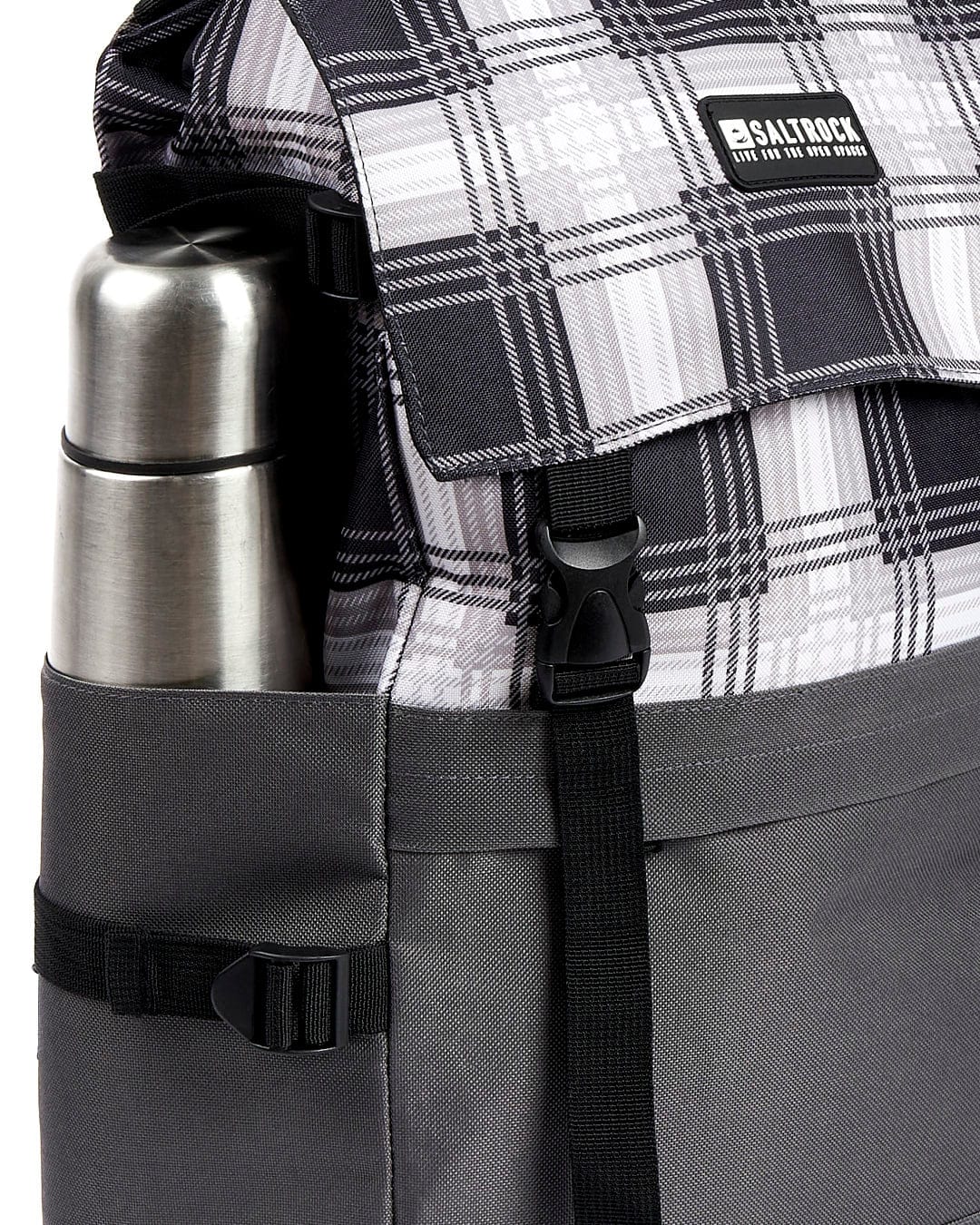 A Saltrock Top Loader - Backpack - Grey with a water bottle.