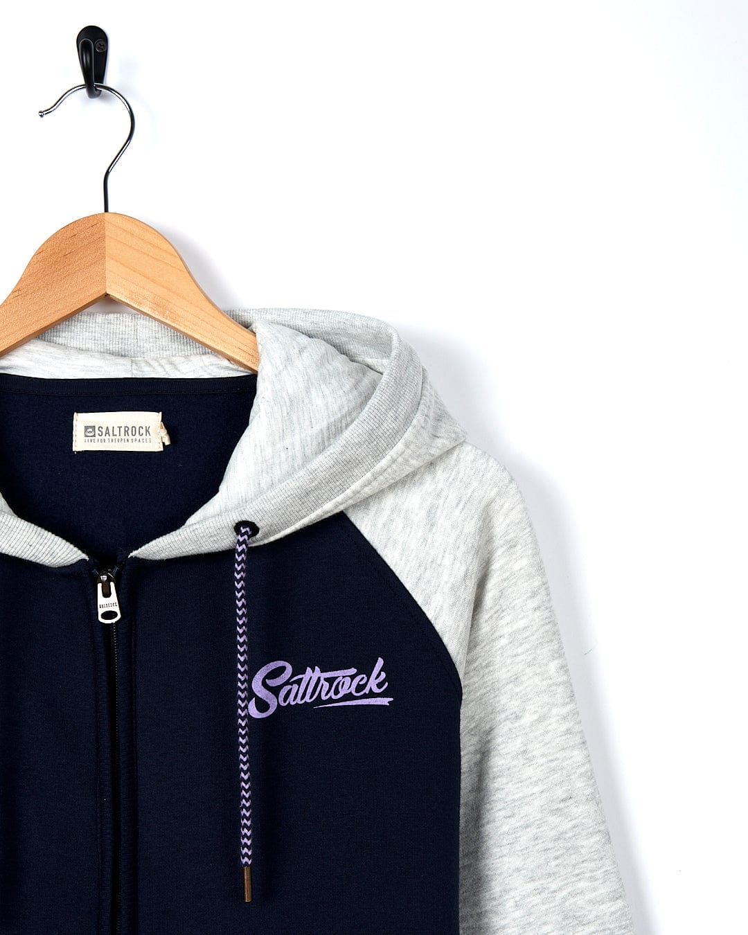 A Saltrock Dark Blue Trademark - Zip Hoodie with the word shitrock on it.