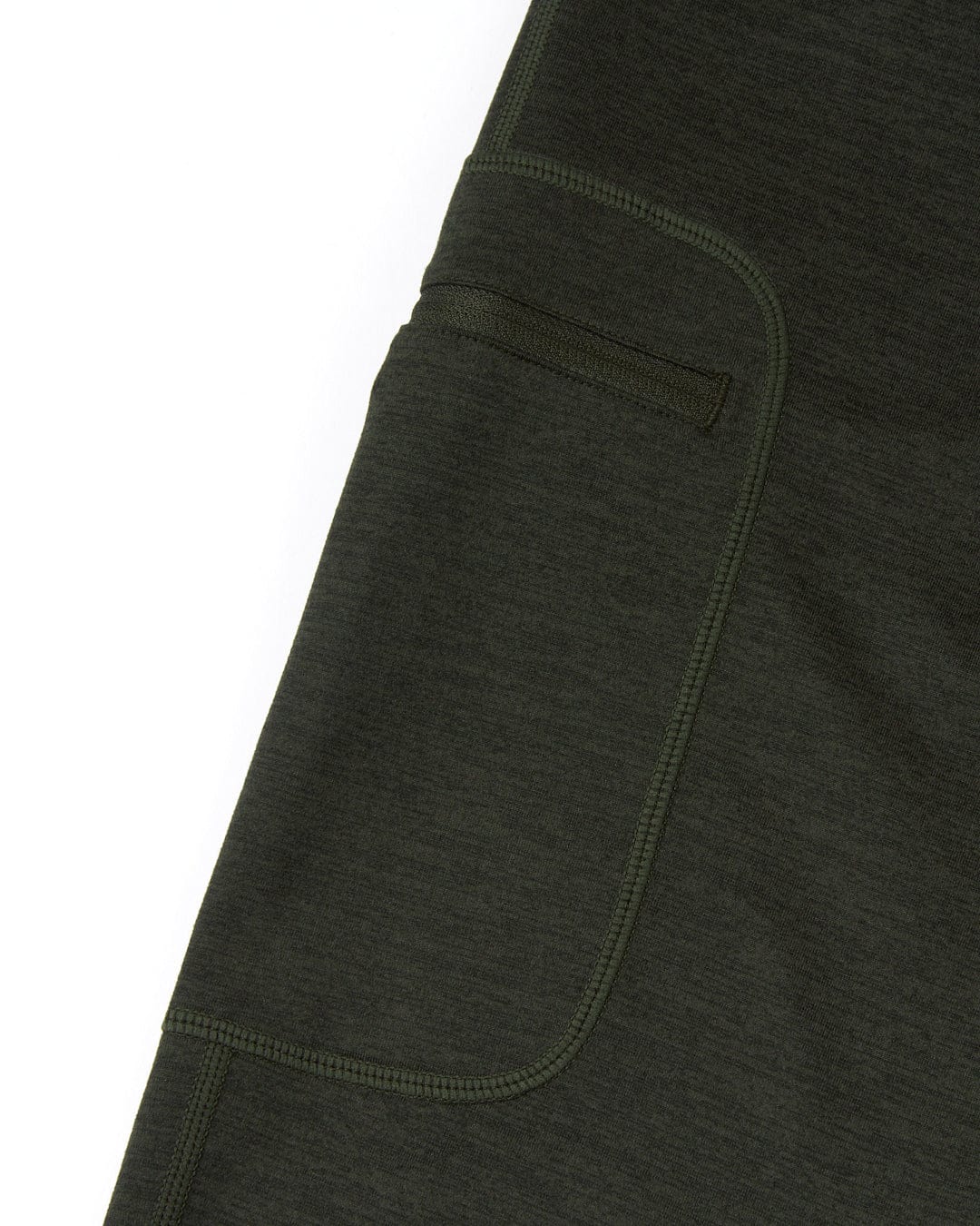 Close-up of Saltrock's Trek - Womens Active Leggings - Dark Green with a visible side thigh zipped pocket detail.