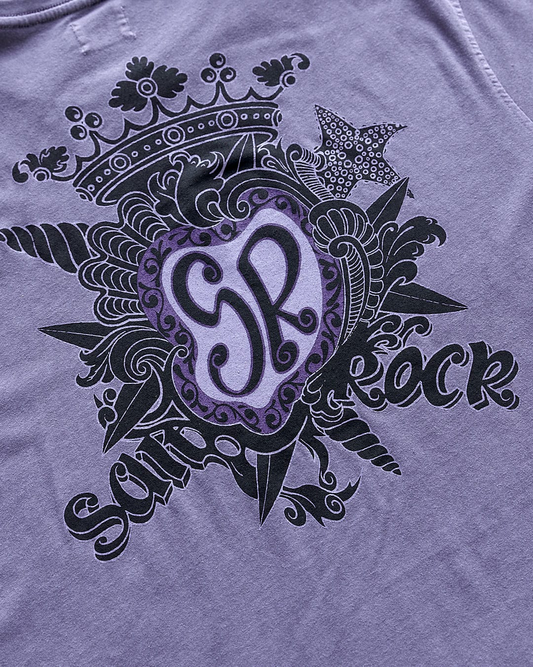 A Tribal Saltrock - Limited Edition 35 Years T-Shirt with an ornate design on it.