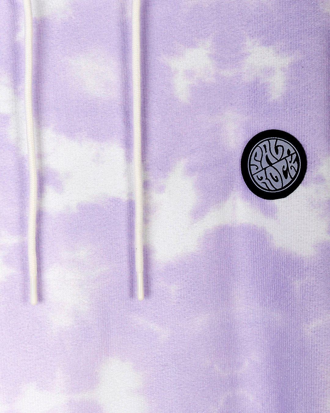 Purple Saltrock Ubud - Womens Tie Dye Changing Towel - Light Purple with a circular black and white graphic patch and white drawstrings.