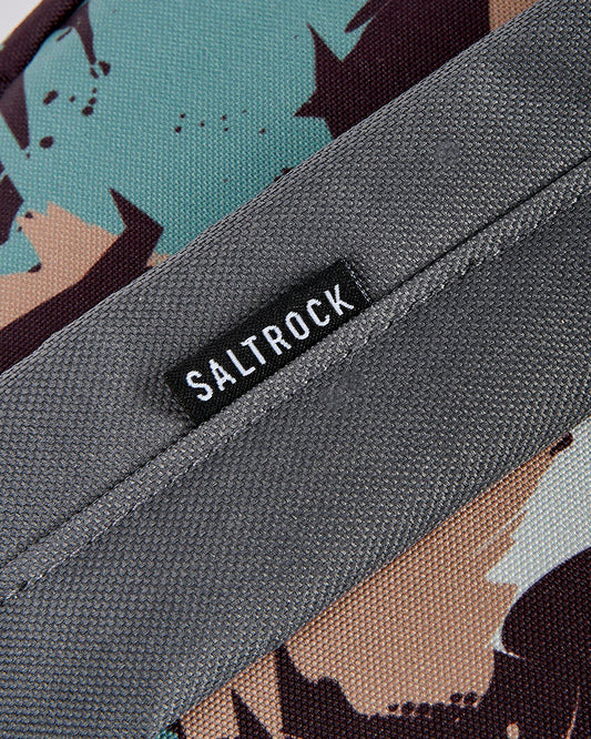 A close up of a Uni-Camo - Backpack - Grey with the word Saltrock on it.