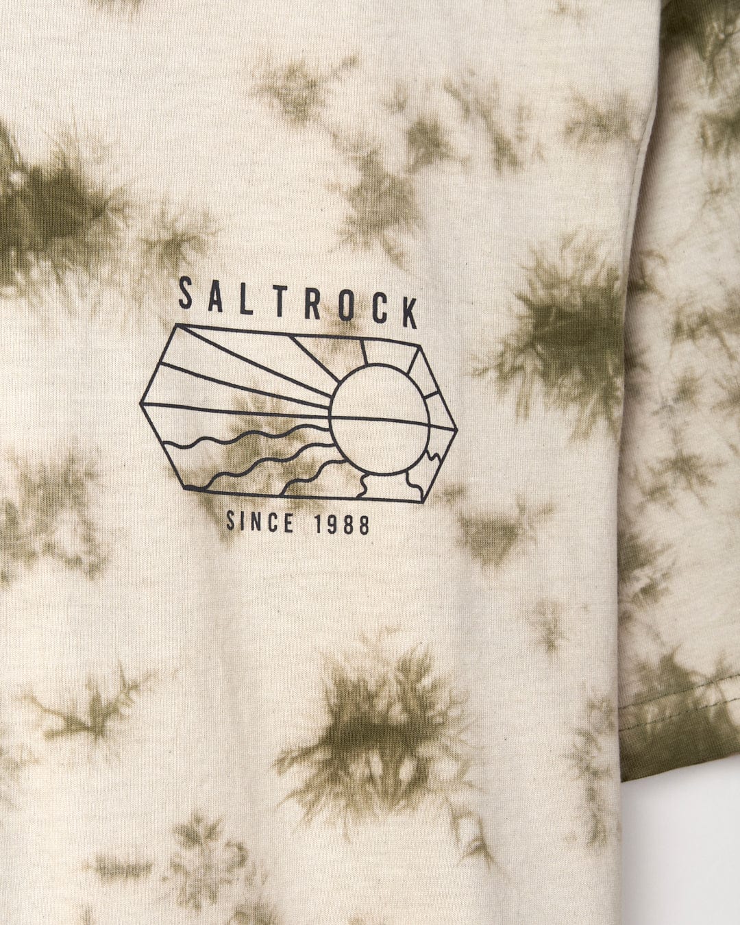 Tie-dye print fabric with Saltrock branding since 1988 logo, machine washable.