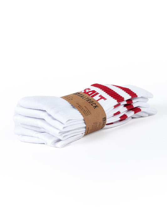 A stack of Varsity - Kids 3 Pack Socks - Red by Saltrock on a white surface.