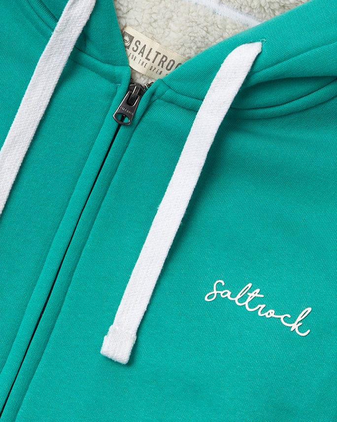 A Velator - Womens Fur Lined Hoodie - Turquoise from Saltrock with white lettering on the front.