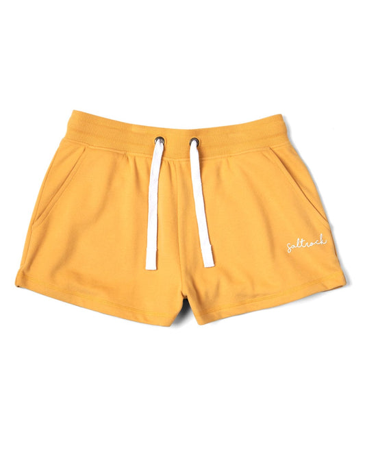 Yellow Velator athletic shorts with an elasticated waist and a white drawstring, featuring the word "Saltrock" embroidered in white on the lower left leg, displayed on a white background.