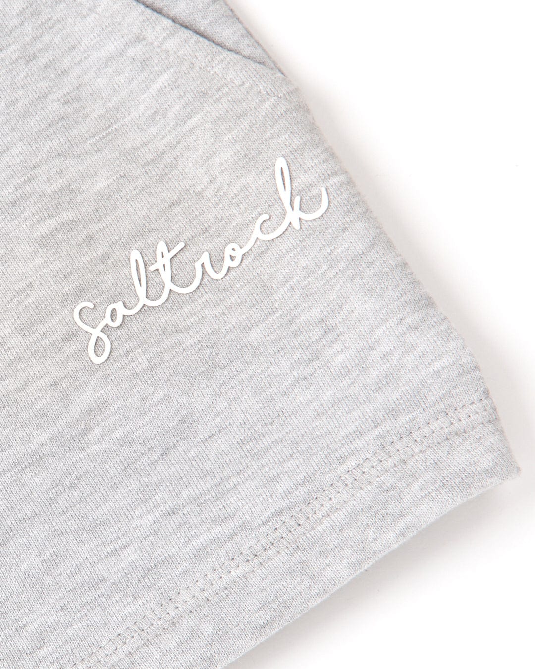 A grey t-shirt with the word "Velator - Womens Sweat Short - Grey" embroidered on it, made of soft jersey material and featuring Saltrock branding.