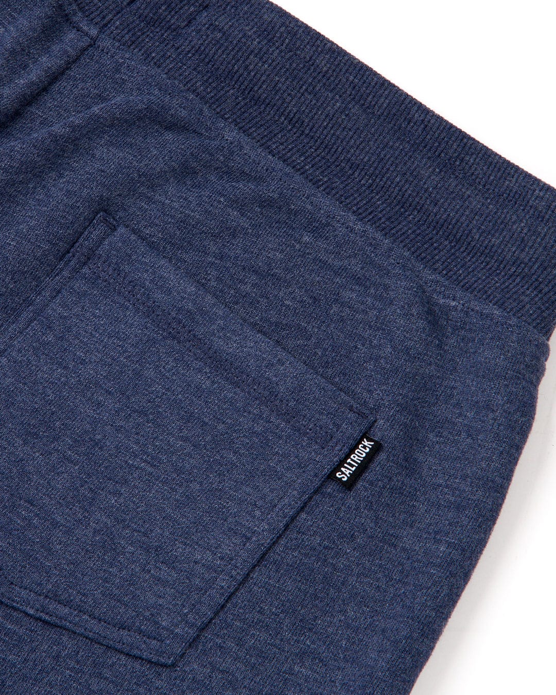 The pocket of a Saltrock Velator Womens Sweat Short in Blue Marl with soft jersey material.