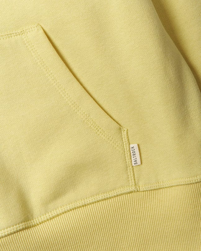 A close up of a Saltrock Velator - Womens Pop Hoodie - Yellow, a yellow hooded sweatshirt from the core classic Velator range.
