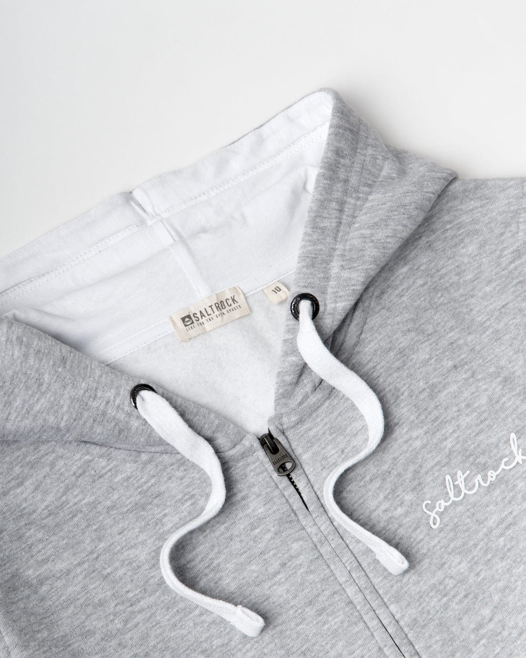 A women's staple wardrobe essential - the Velator Womens Zip Hoodie in Grey featuring Saltrock branding with a white logo.