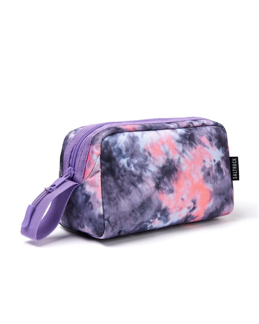 A small Vision tie-dye pencil case featuring Saltrock branding, in shades of purple, pink, and gray with a zip fasten and a fabric loop on one end.