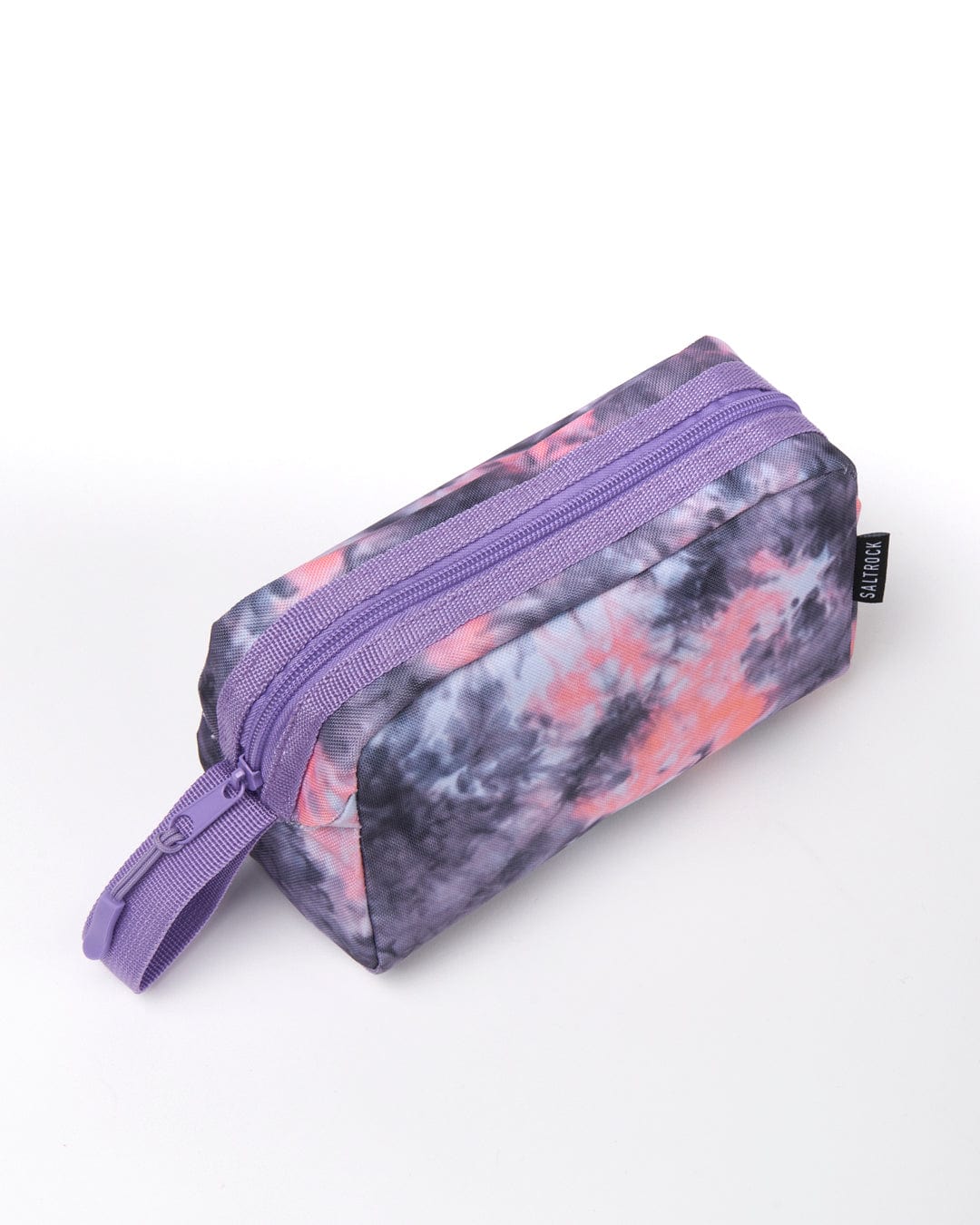 A Saltrock Vision- Tie Dye Pencil Case - Purple with a zipper, displayed against a white background.