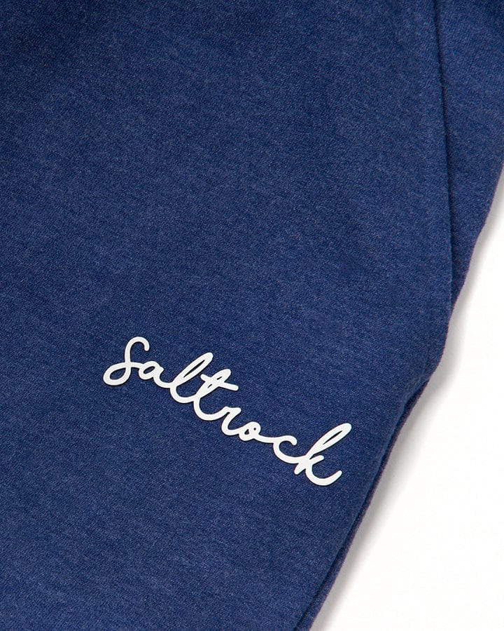 A close up of a blue Velator - Womens Sweat Shorts - Navy with the Saltrock branding on it.