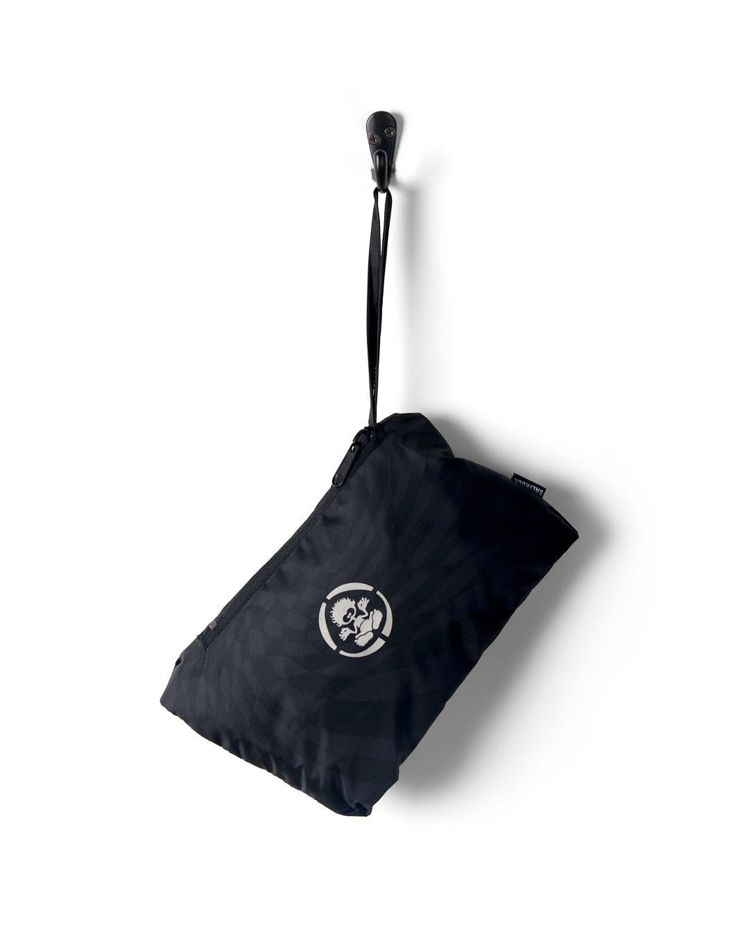 A black foldable umbrella with a white Saltrock logo, displayed closed and leaning diagonally on a white background.