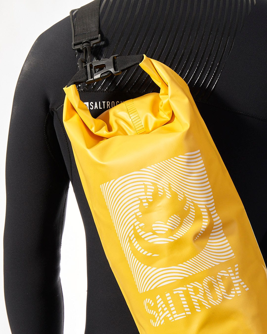 A waterproof yellow wetsuit featuring the word Saltrock.
becomes:
A waterproof yellow Wave - 10L Drybag - Yellow wetsuit featuring the word Saltrock.
